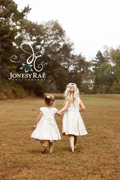sisters by the award wining diana toone of jonesy rae photography in sandy utah of the salt lake city area with newborn baby and child portraits (2)